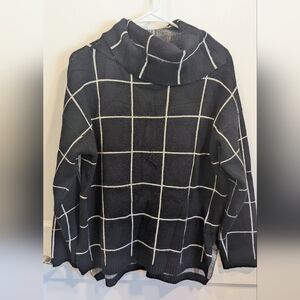 Elegant Black and White Grid Turtleneck Sweater